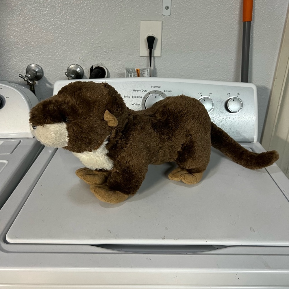 Adorable large plush sea otter